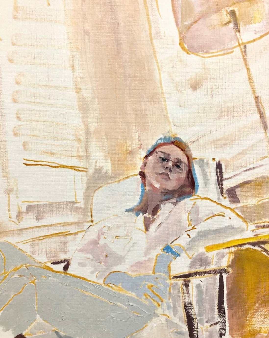 Figure reclining in an armchair in cream and gold tones